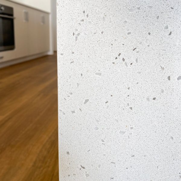 A close up of a Chalkstone waterfall edge in a Forrestdale new home in Perth