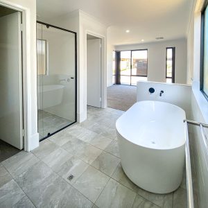 An open plan ensuite by Move Homes in Alkimos